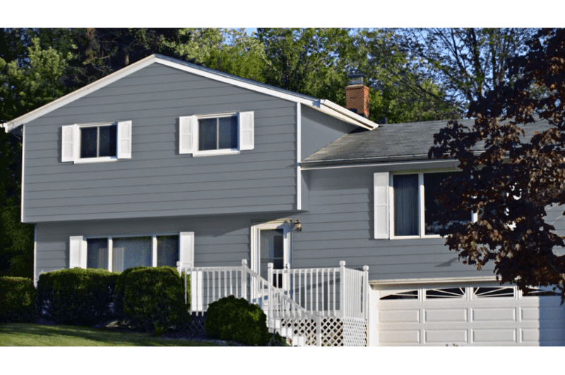 A gray house with white trim. Serious gray by Sherwin Williams.