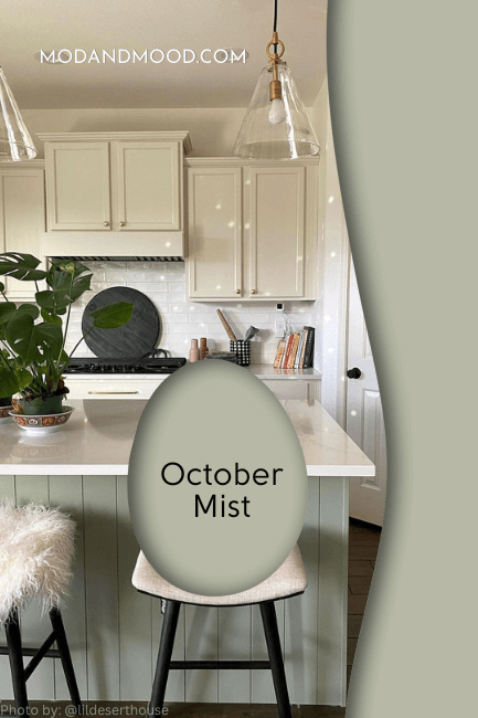 Benjamin Moore October Mist swatched over a background of October Mist on an island and Farrow and Ball off white on wall cabinets in the background.