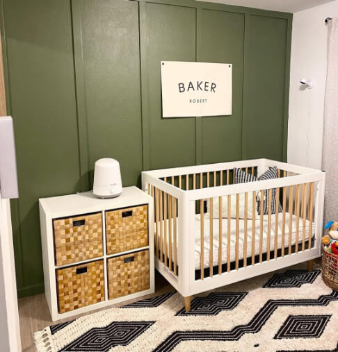 Sherwin Williams Oak Moss on a board and batten wall in a nursery