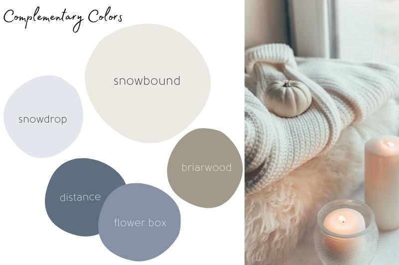 Graphic reads "Complementary Colors" with a picture of cozy folded blankets beside candles on the right. Colored dots of paint colors are on a white background to the left. Colors are Snowbound, Snowdrop, Briarwood, distance, and flower box.