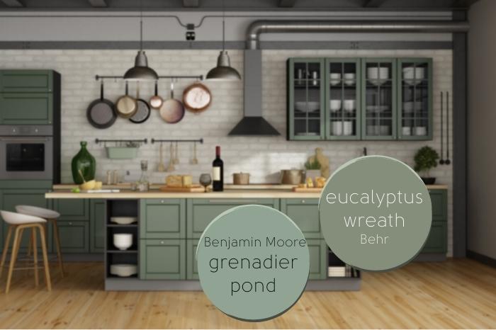 Benjamin Moore Grenadier pond and Behr's Eucalyptus Wreath over a background of a kitchen with mid-toned eucalyptus cabinets.
