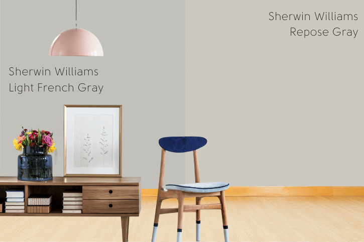 Light French Gray vs Repose Gray on a wall in a room with warm wood floors and a coffee table with a chair, and a pink pendant light.
