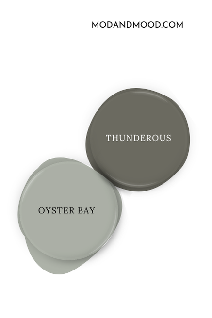 Sherwin Williams Thunderous swatched beside coordinating color Oyster Bay