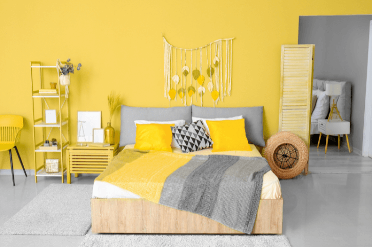 Bright yellow and gray in a bedroom