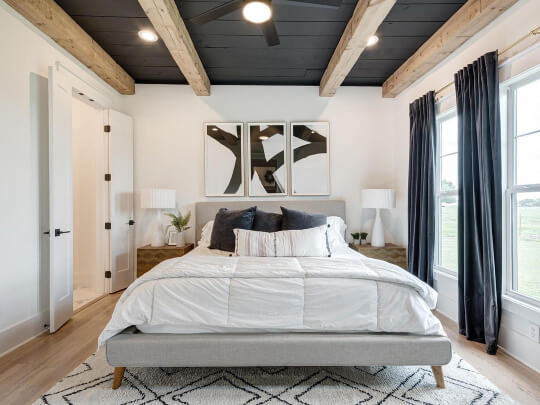Cyberspace shiplap on bedroom ceiling with beams. Pure White walls and trim.