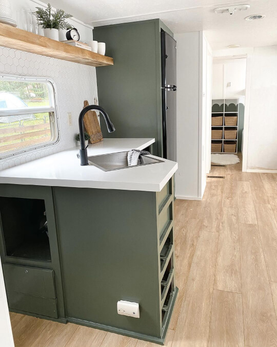 Rosemary cabinets in a trailer