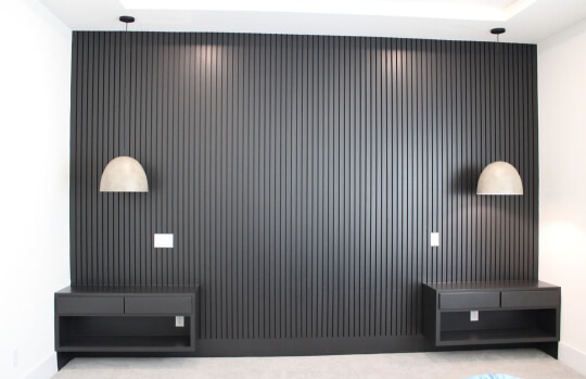 Tricorn Black slatted accent wall with pendant lights