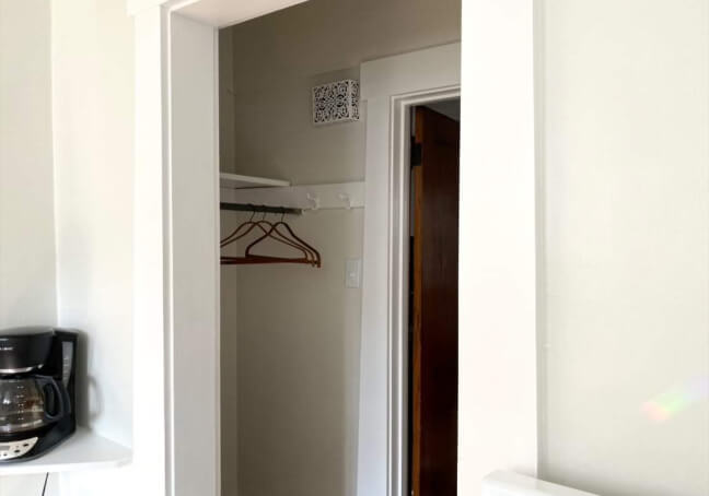 Ethereal white bedroom opens into Ethereal White walk in closet. Both have Extra White trim.