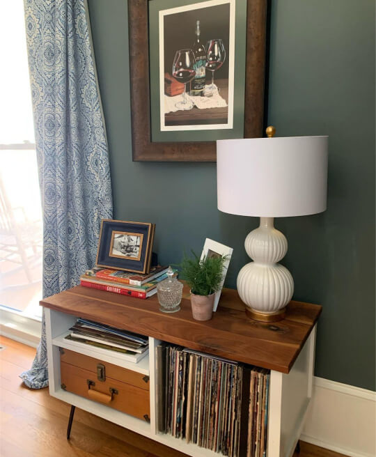 Sherwin Williams Homburg Gray with Alabaster Trim behind a retro bookcase