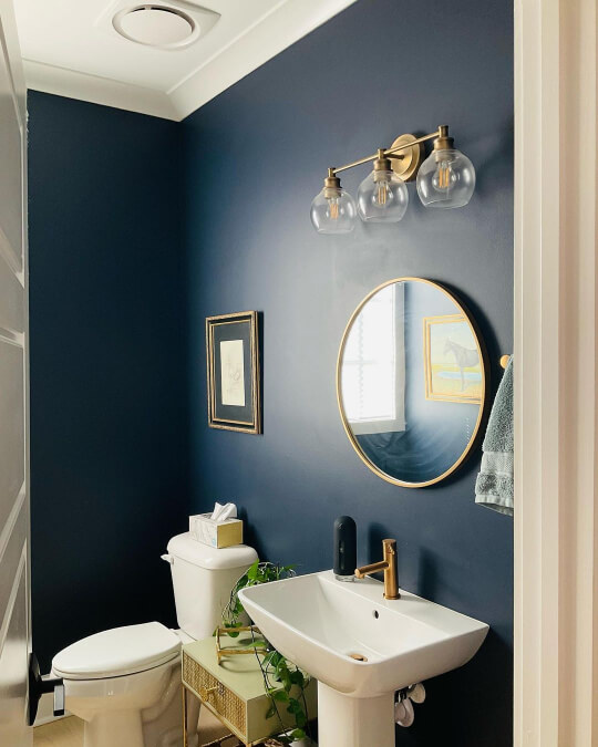 Naval Bathroom with gold accents and white ceiling