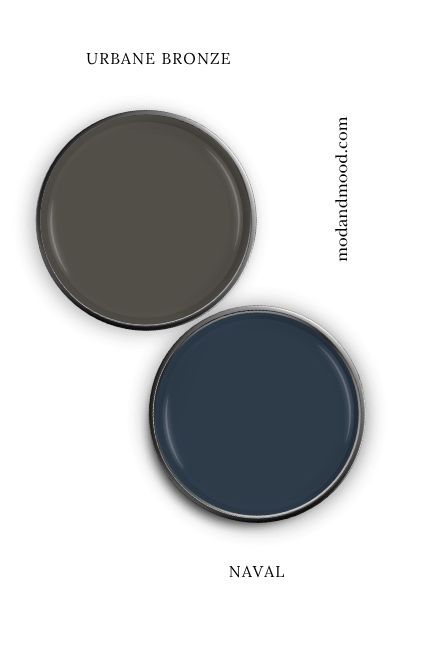 Sherwin Williams Naval swatched on a paint lid alongside the same of coordinating color Sherwin Williams Urbane Bronze.