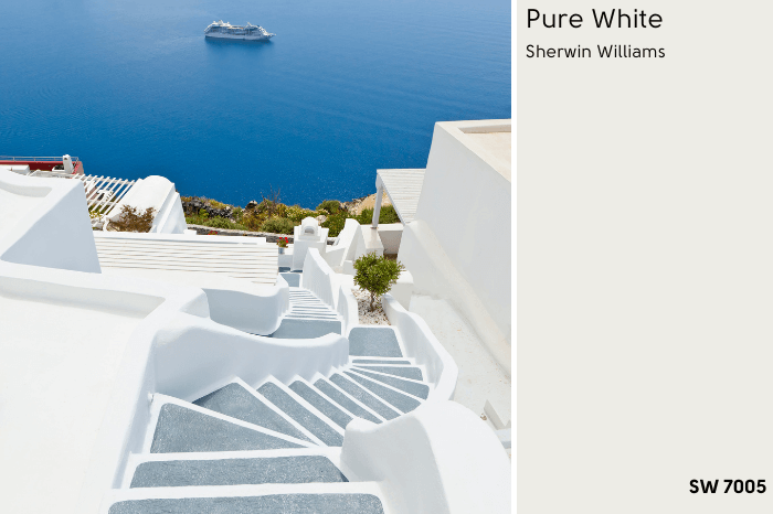 Pure White swatched beside steps leading down to the ocean in a whitewashed greek village