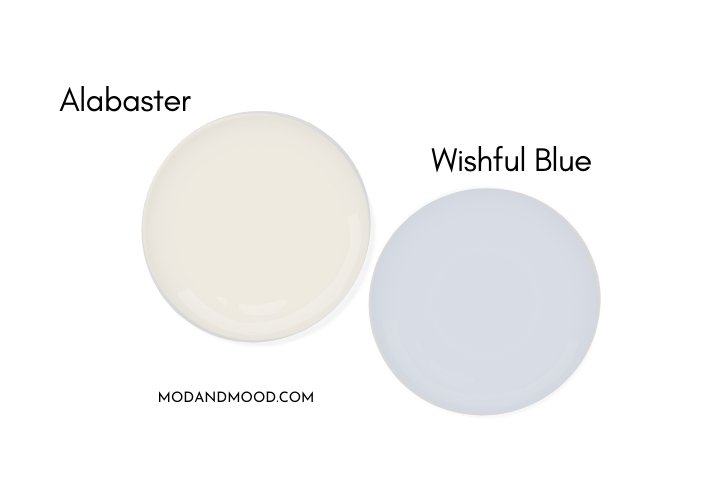 SW Alabaster paint drop beside a paint drop of Wishful Blue