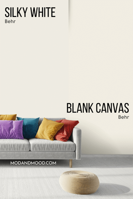 Behr Silky White on half of a wall and Blank Canvas on the other half behind a light gray sofa