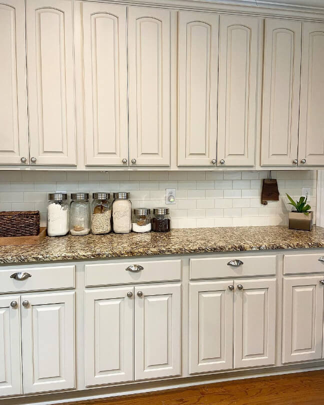 Upper and Lower cabinets in Sherwin Williams Accessible Beige at double strength.
