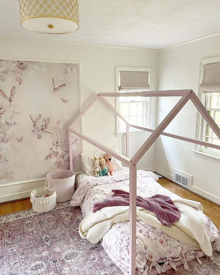 White Dove Walls trim and ceiling in a little girls nursery or toddler room with pops of lavender and a house bed