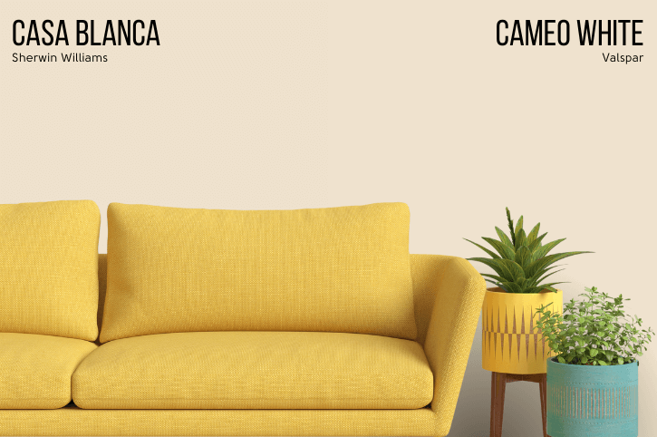 Valspar Casa Blanca Dupe Cameo White on half of a wall with Casa Blanca on the other half behind a mustard sofa