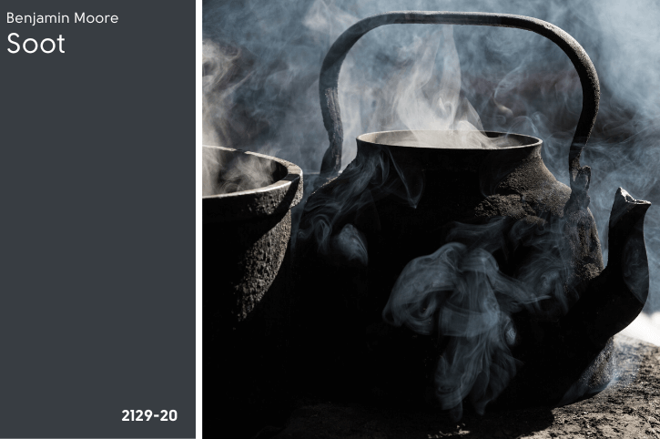 Benjamin Moore Soot swatched beside an iron kettle in a smokey fireplace