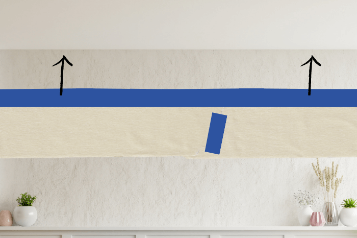 Illustration of how to use blue tape and masking paper to line the ceiling