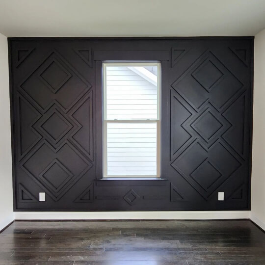 Matte Black wood geometric wall in a living room, painted in Tricorn Black