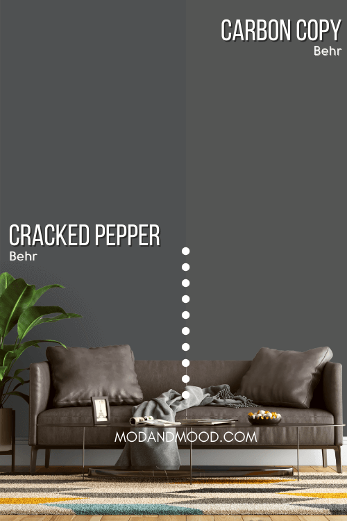 Behr Cracked Pepper on one half of a wall with Carbon Copy on the other half behind a gray leather sofa and neutral living room decor