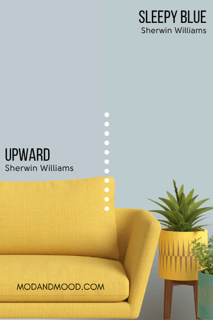 Sherwin Williams Upward on half of a wall and Sleepy Blue on the other half behind a mustard sofa.