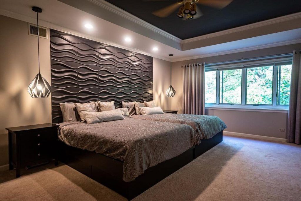 Sherwin Williams Perle Noir Bedroom painted in the center of the wall between the pendant lights.