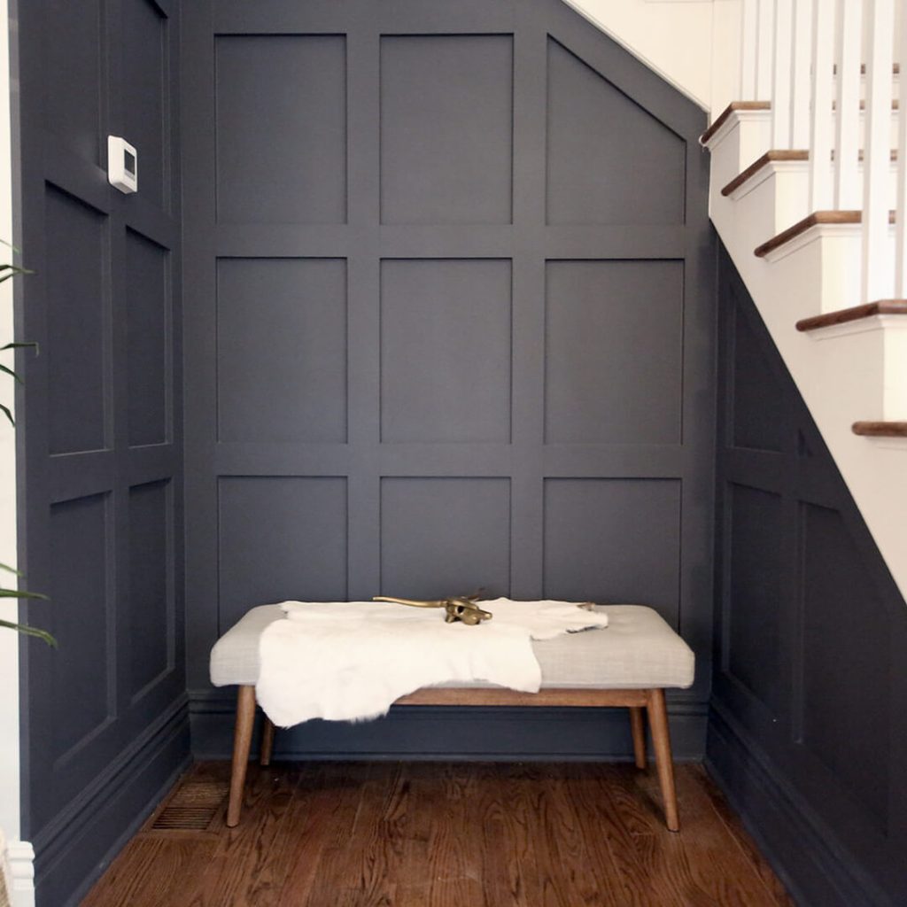 Sherwin Williams Perle Noir on board and batten feature wall beside the staircase