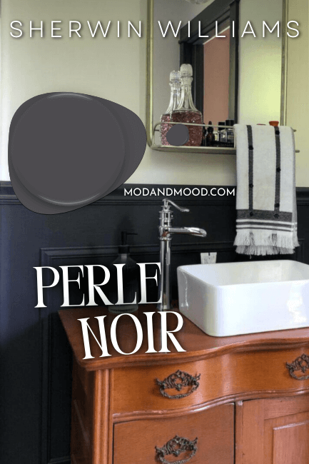 paint dot of perle noir over a photo of the color on wainscoting in a bathroom with creamy white upper walls.