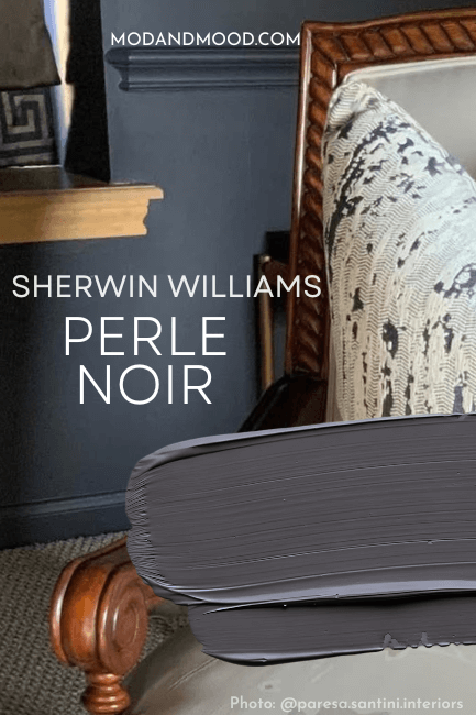 Perle Noir looking blue on the wall behind a chair