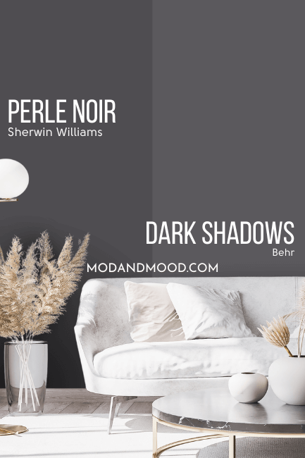 Sherwin Williams Perle Noir on half of a wall with Behr dupe Dark Shadows on the other half, above a white sofa.