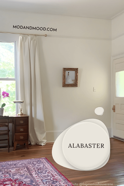 A bedroom with walls and trim in Alabaster