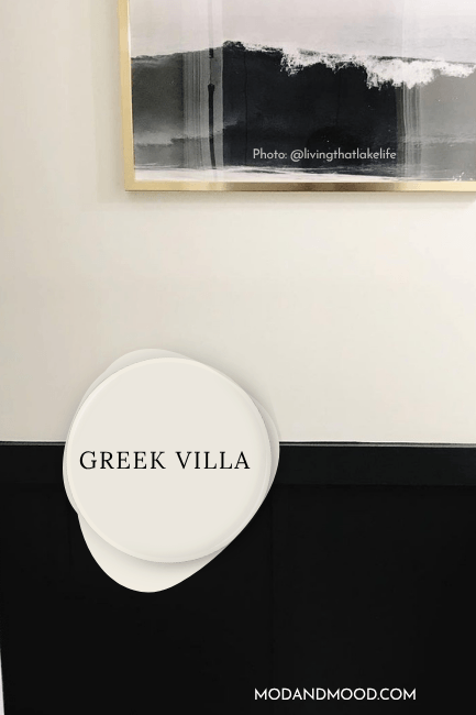 Sherwin Williams Greek Villa on bathroom walls above SW Jasper wainscoting, with a watercolor print hung on the wall.