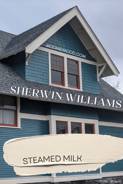 Sherwin Williams Steamed Milk on trim on a teal exterior.
