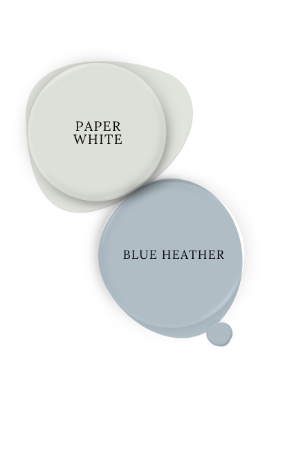 Paint dot of Benjamin Moore Blue Heather beside the same of coordinating color Paper White.