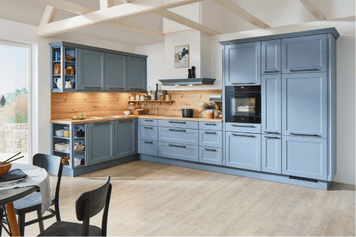 Sherwin Williams Whirlpool on kitchen cabinets in a big kitchen with beams on the ceiling