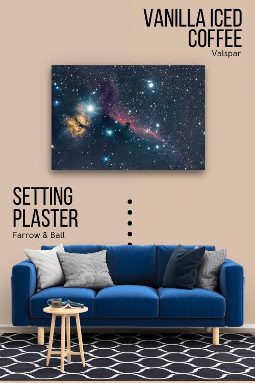 Farrow & Ball Setting Plaster on half of a wall behind a navy velvet sofa, and Valspar version Vanilla Iced Coffee on the other half.