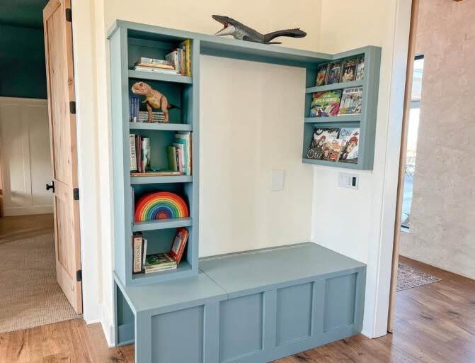 Sherwin Williams Whirlpool on a built in bookshelf in a room with SW Whitetail creamy white walls.