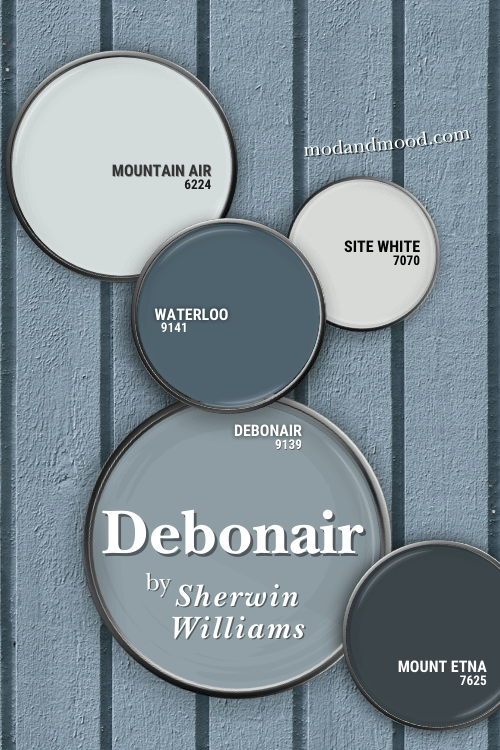 Sherwin Williams recommended coordinating colors for Debonair: Mountain Air, Waterloo, Site White, alongside Debonair and Mount Etna, all on paint lids over a slatted fence in the color of Debonair.