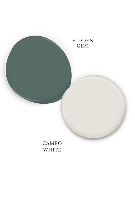 Behr Hidden Gem swatched above coordinating color Behr Cameo White.