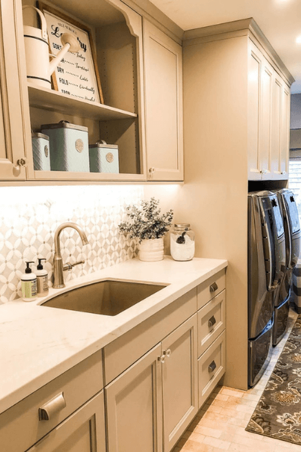 Warm beige on kitchen cabinets with white countertops.