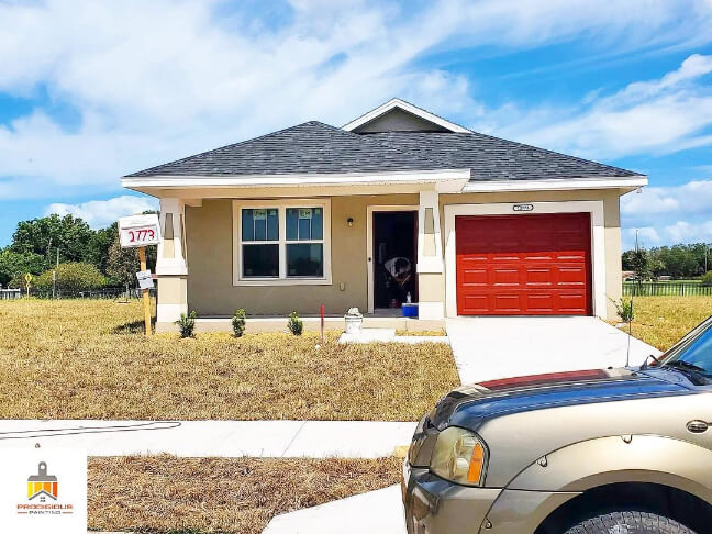 Sherwin Williams Universal Khaki on the stucco exterior of a bungalow.