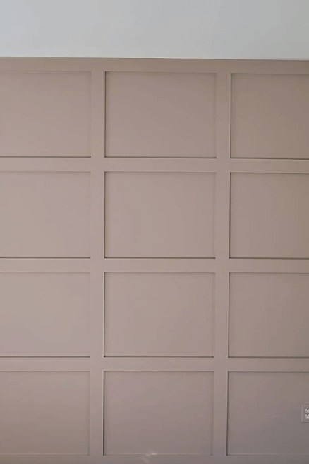 Behr Parisian Cafe on a panelled wall.