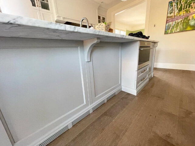 Benjamin Moore Coventry Gray on a kitchen island where it looks like Gray Owl