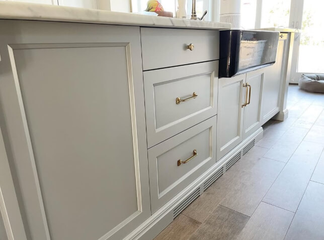 Benjamin Moore Coventry Gray on a kitchen island where it looks like Gray Owl