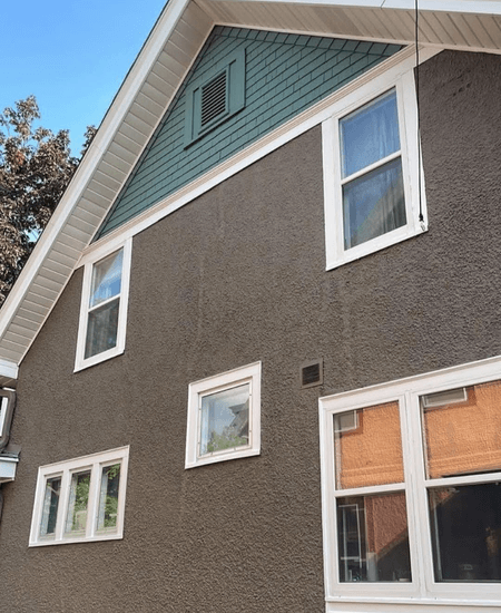 Benjamin Moore Silhouette lookalike on stucco where the color looks warmer.