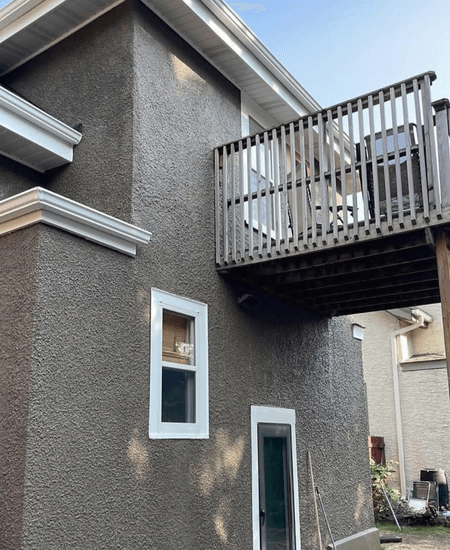 Benjamin Moore Silhouette lookalike on a brown stucco exterior