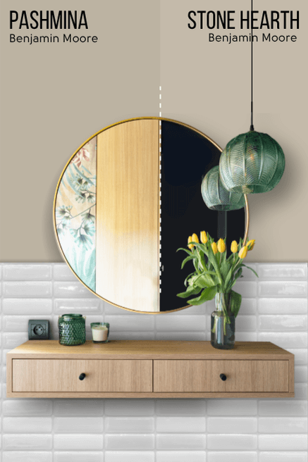 Benjamin Moore Stone Hearth on half of a wall and Benjamin Moore Pashmina on the other half behind a round mirror and floating vanity in a bathroom.