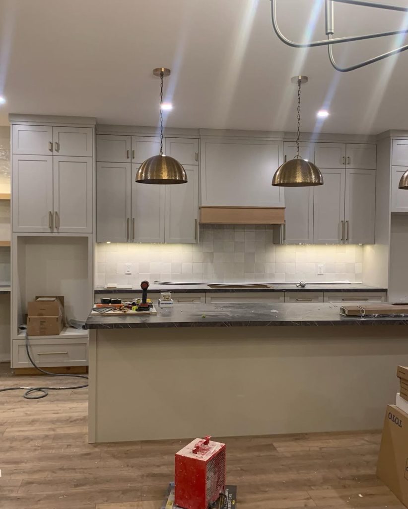 Benjamin Moore Stone Hearth looks more taupey on kitchen cabinets in lower natural light.