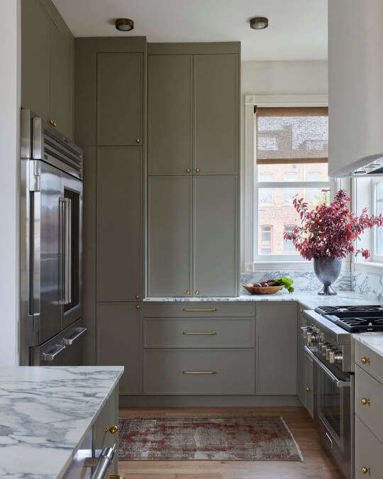 Desert Grey semihandmade cabinets where the color looks green.